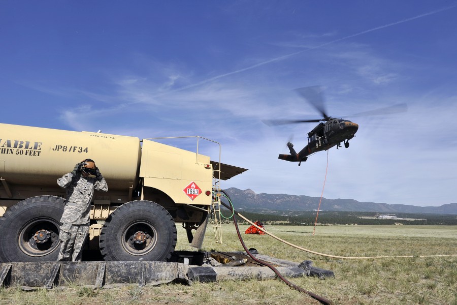 A U.S. Army UH-60 Black Hawk helicopter with the Colorado Army National Guard leaves a refueling point to fight a wildfire near Colorado Springs, Colo., June 12, 2013 130612-F-JM997-878