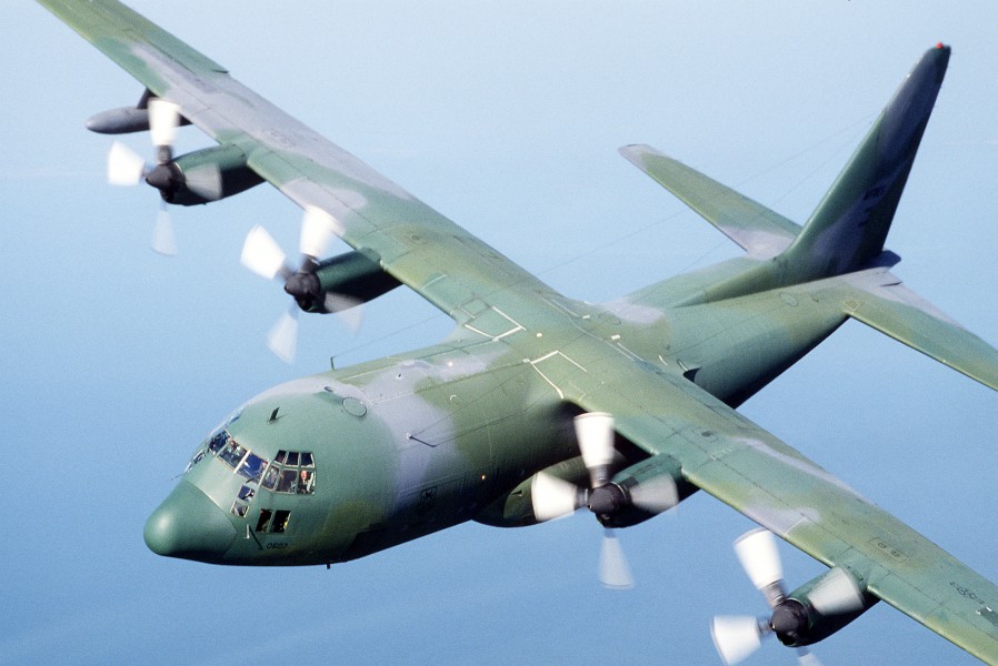 An air-to-air left front view of a 95th Tactical Airlift Squadron C-130 Hercules aircraft DF-ST-89-04148