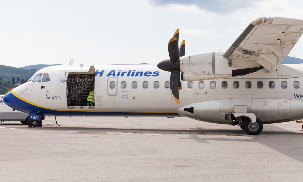 a BH Airlines airplane photographed in Tivat, Montenegro in August 2014, picture 3
