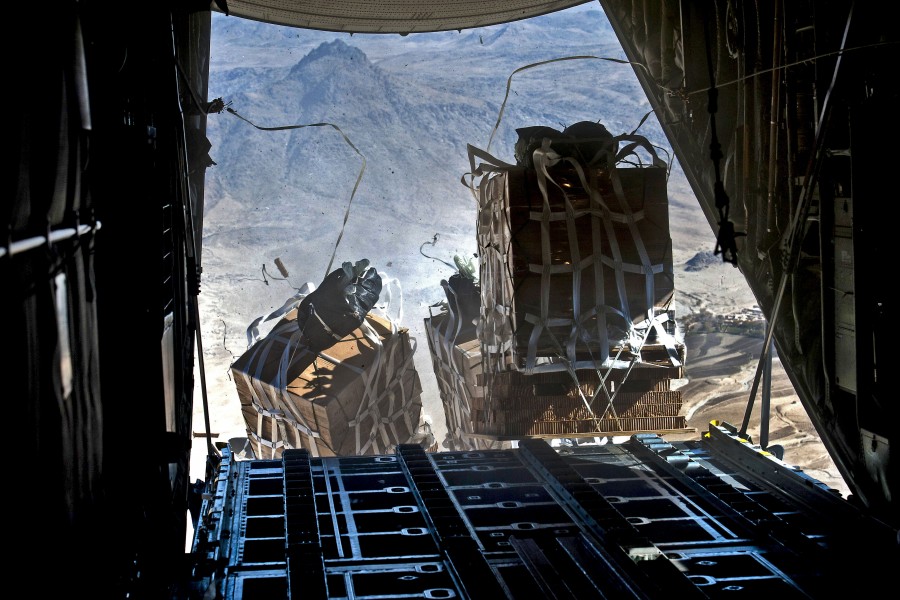 Defense.gov News Photo 111123-F-CP197-004 - Crews drop pallets of food and supplies from a U.S. Air Force C-130 Hercules aircraft over Bagram Airfield in Kandahar Afghanistan on Nov. 23