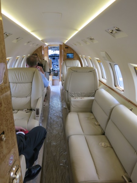 Interior of Hawker 1000 cabin with passengers