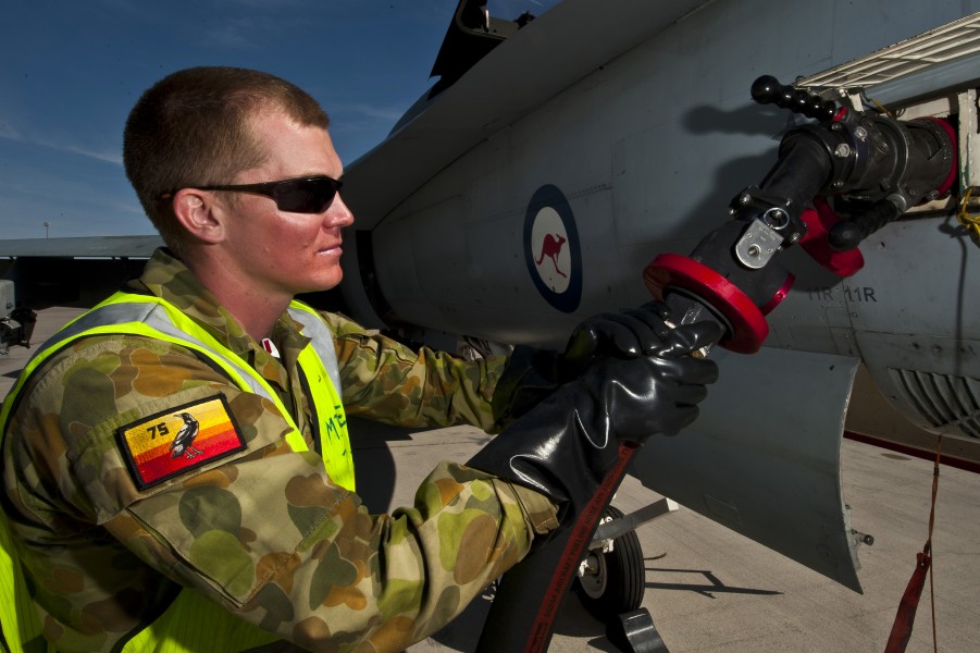 RAAF airman refueling an FA-18 during a Red Flag exercise in the the US