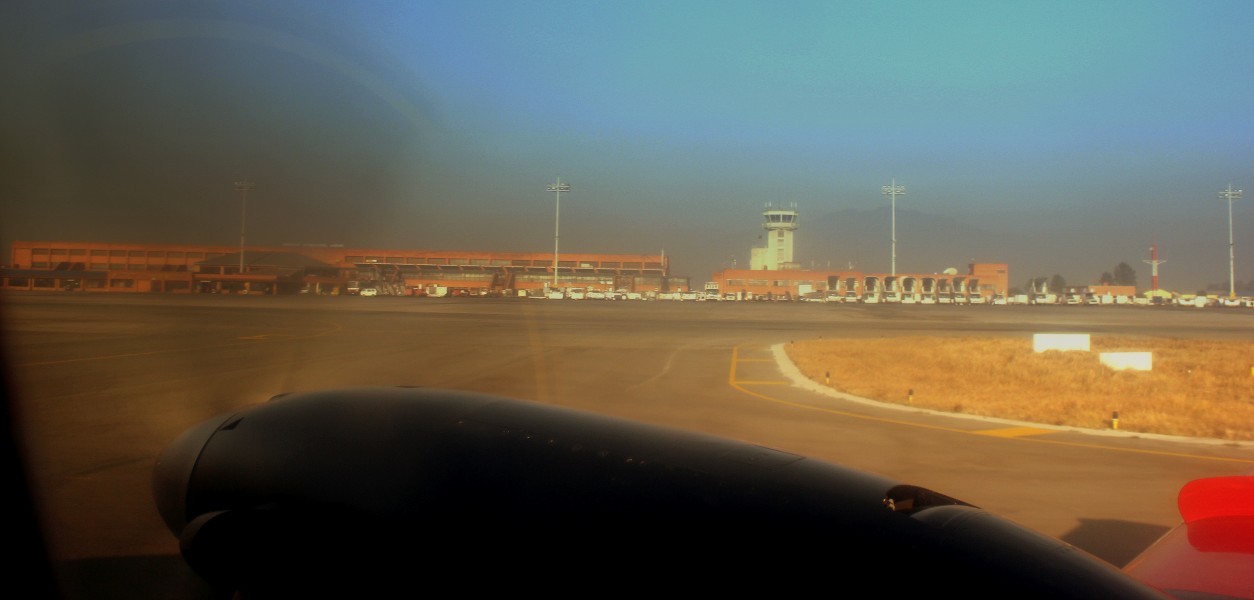 SIMRIK AIRLINES FLIGHT SMA301 9N-AGL BEECH1900 ON THE GROUND AT KATHMANDU TRIBHUVAN AIRPORT NEPAL FEB 2013 (8570552435)