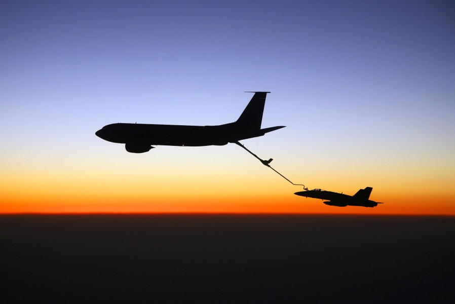 US Navy 070827-N-6346S-766 An F-A-18C Hornet, assigned to the Knighthawks of Strike Fighter Squadron (VFA) 136, receives fuel from an Air Force KC-135 tanker over southern Iraq