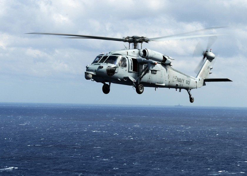 US Navy 100303-N-3885H-096 An MH-60S Sea Hawk helicopter flies over the Atlantic Ocean