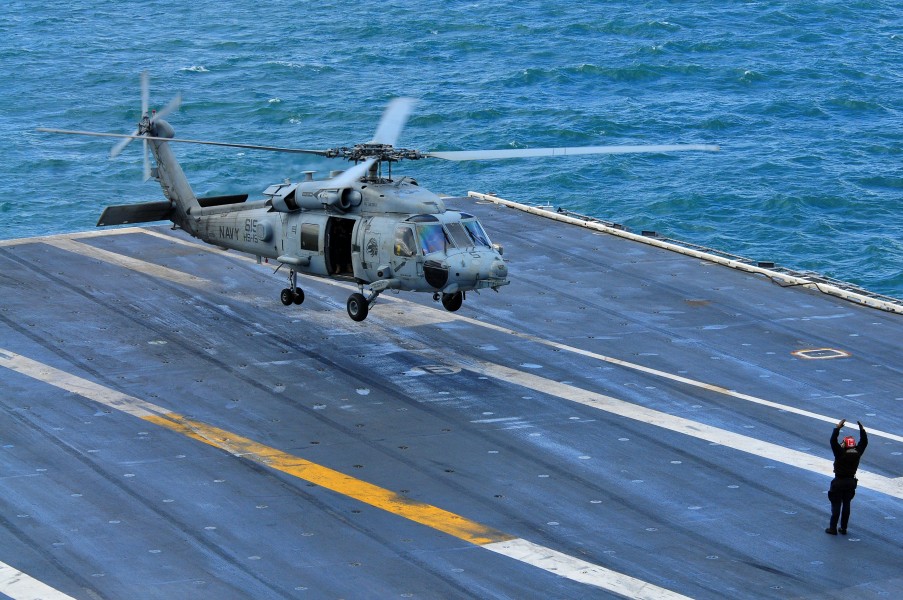 US Navy 100315-N-9983H-123 An SH-60F Sea Hawk helicopter lifts off from the Nimitz-class aircraft carrier USS Carl Vinson (CVN 70) during a transit of the Strait of Magellan on her way to the Pacific Ocean
