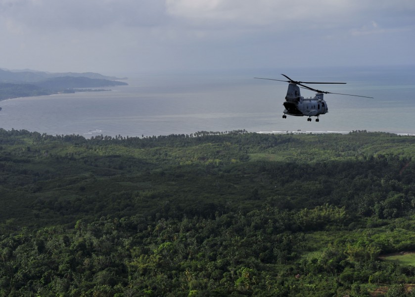 US Navy 101106-N-1531D-030 A CH-46E Sea Knight helicopter conducts aerial damage assessments of Haiti after Hurricane Tomas made landfall