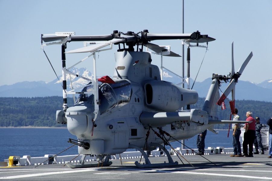 US Navy 110801-N-ZC343-582 A U.S. Marine Corps AH-1W Cobra helicopter is chained to the flight deck aboard the amphibious assault ship USS Bonhomme