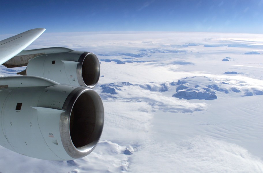 View over an DC-8 wing with CFM-56 engines to antarctica