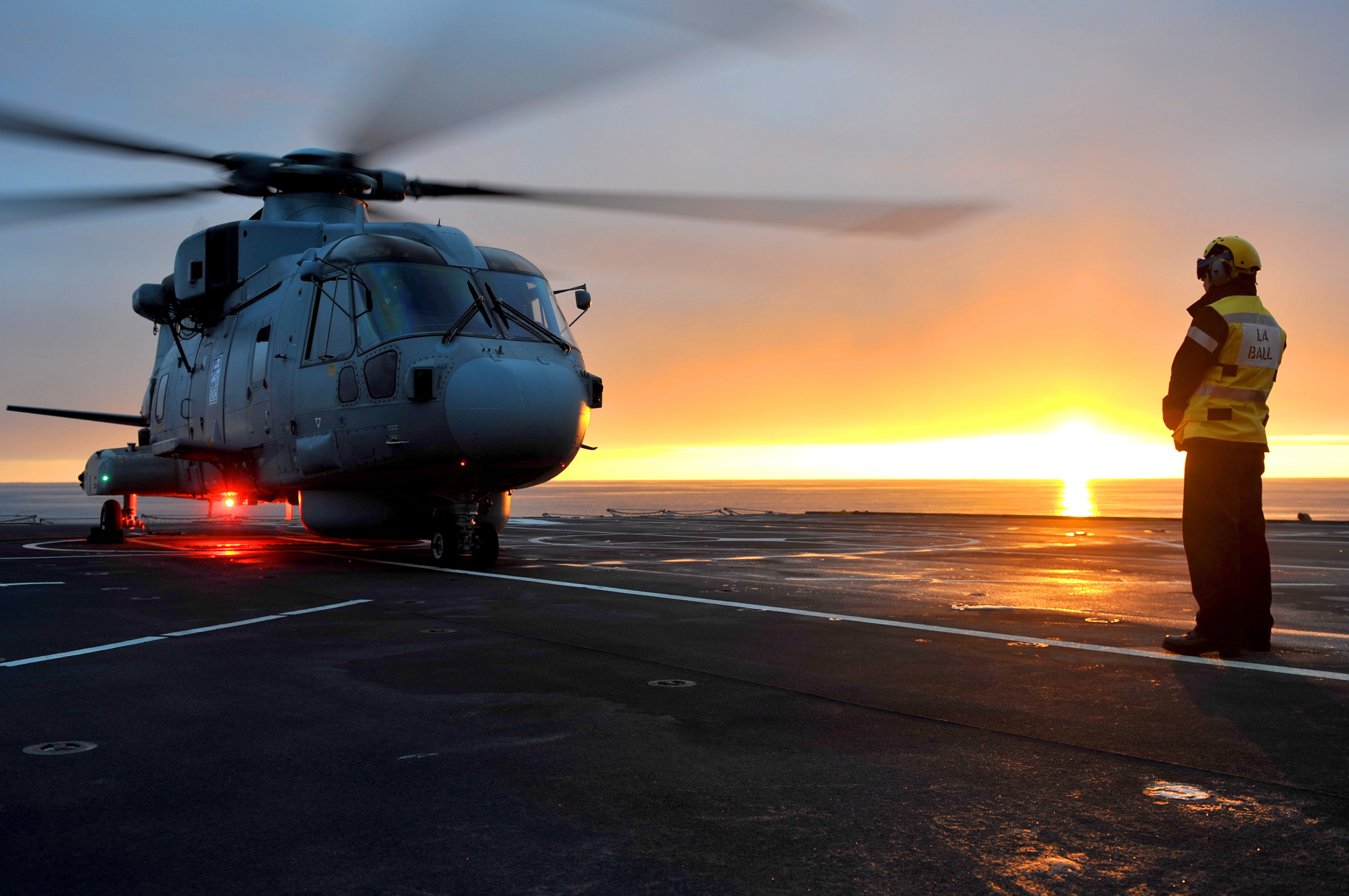 Royal Navy Merlin Helicopter Prepares to Takeoff from RFA Argus MOD 45153599