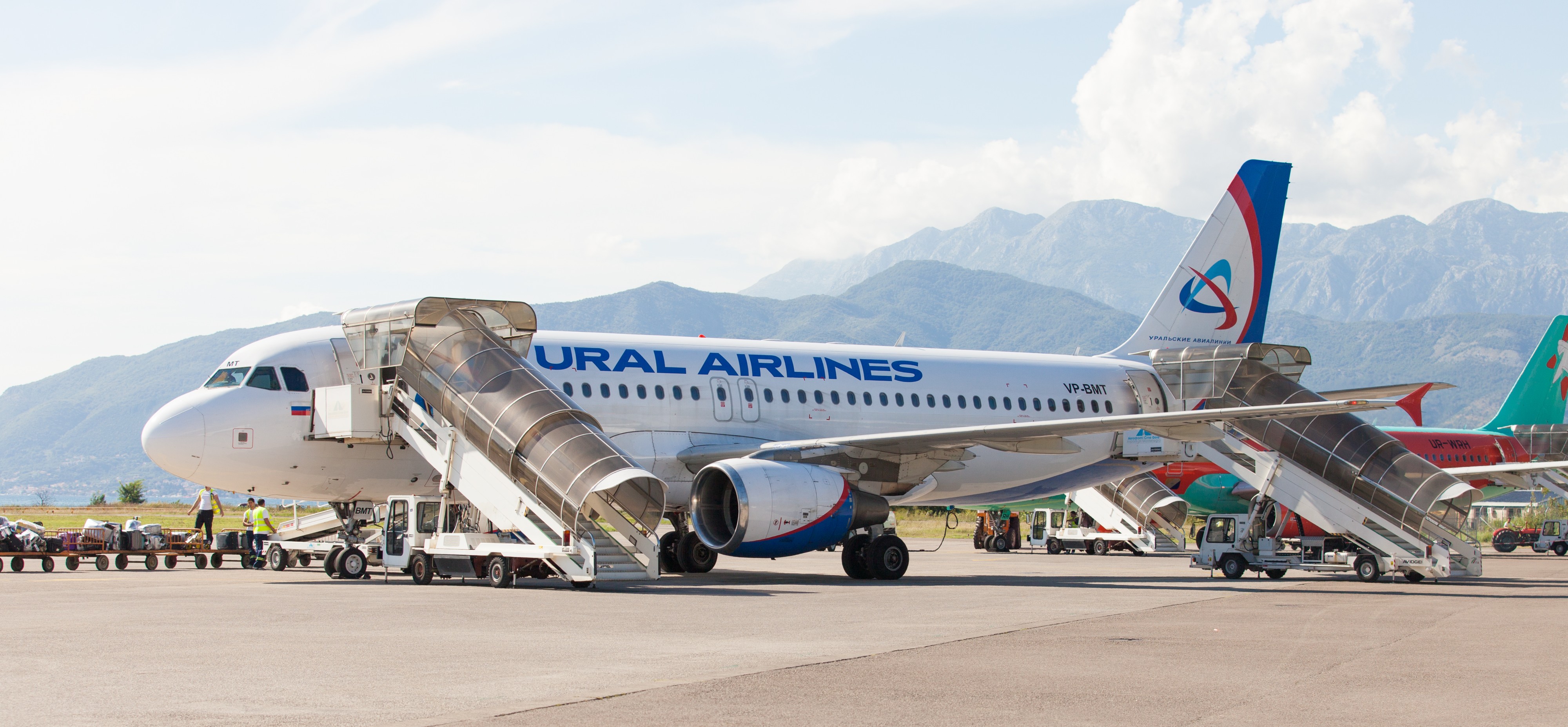 a Ural Airlines airplane photographed in Tivat, Montenegro in August 2014, picture 9