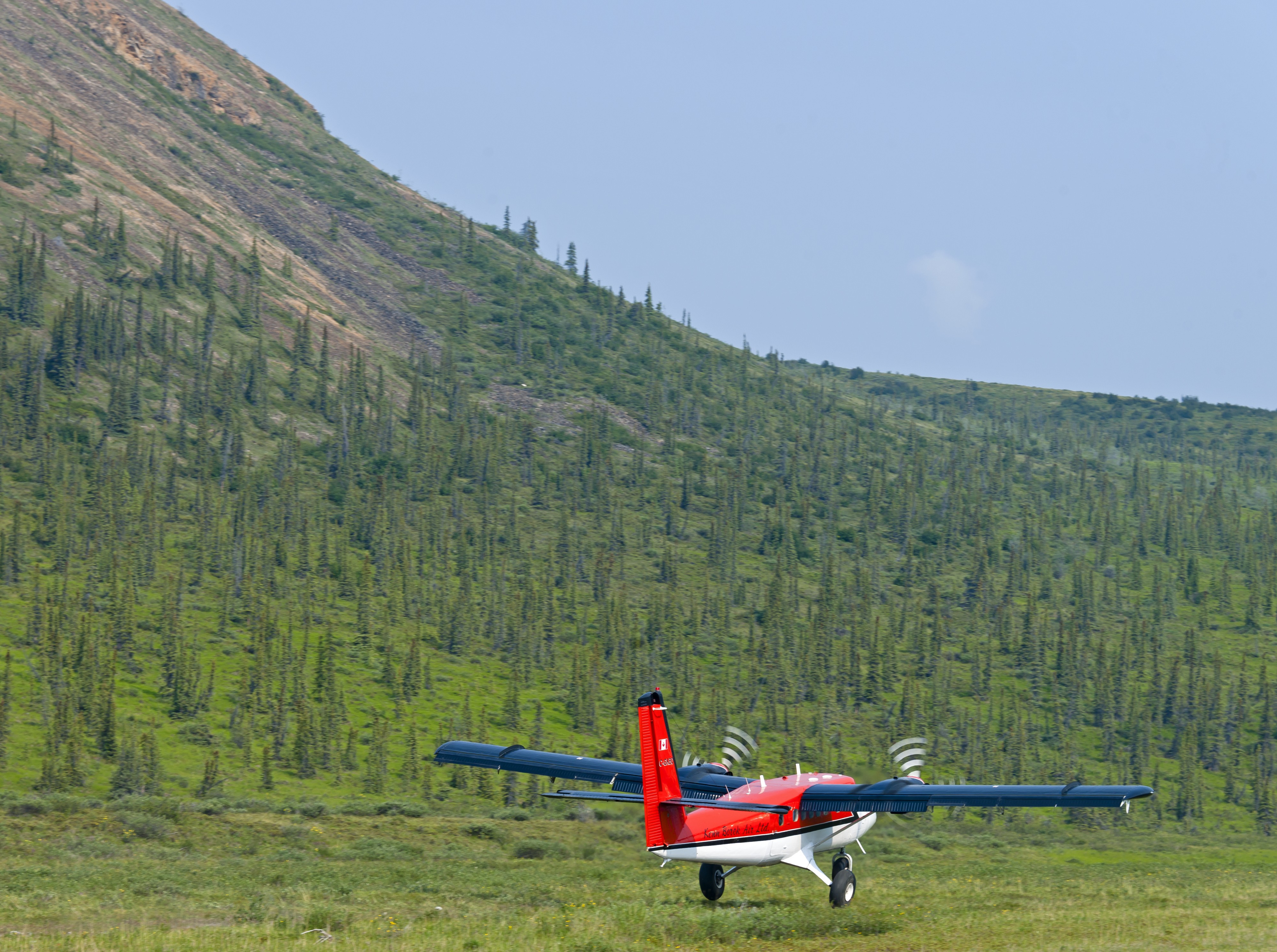 Kenn Borek Air Twin Otter taking off from airstrip in Ivavvik National Park