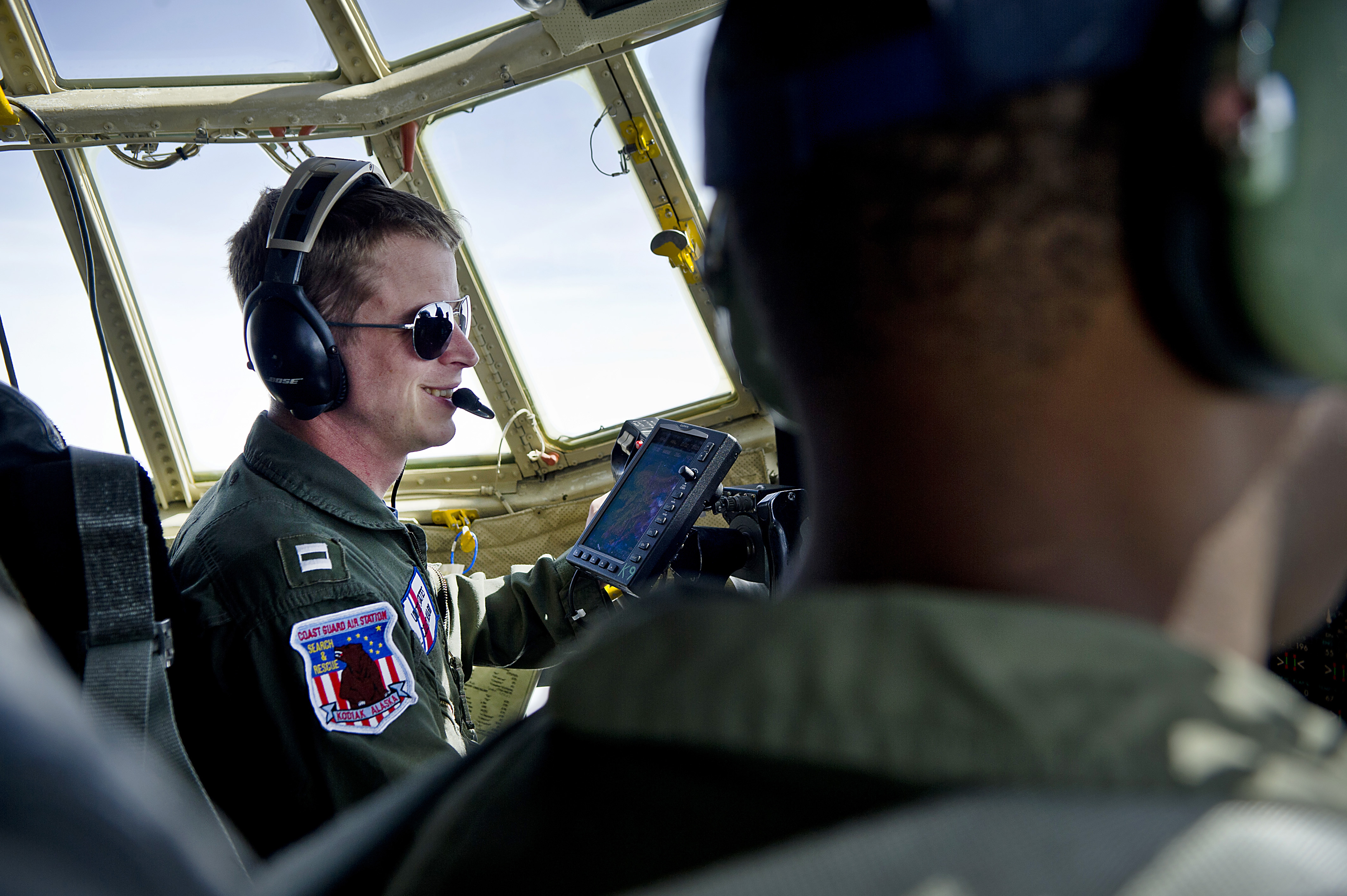 U.S. Coast Guard Lt. Ken Gillespie, an HC-130H Hercules aircraft pilot, flies to Barrow, Alaska, June 28, 2012 120628-F-MQ656-281
