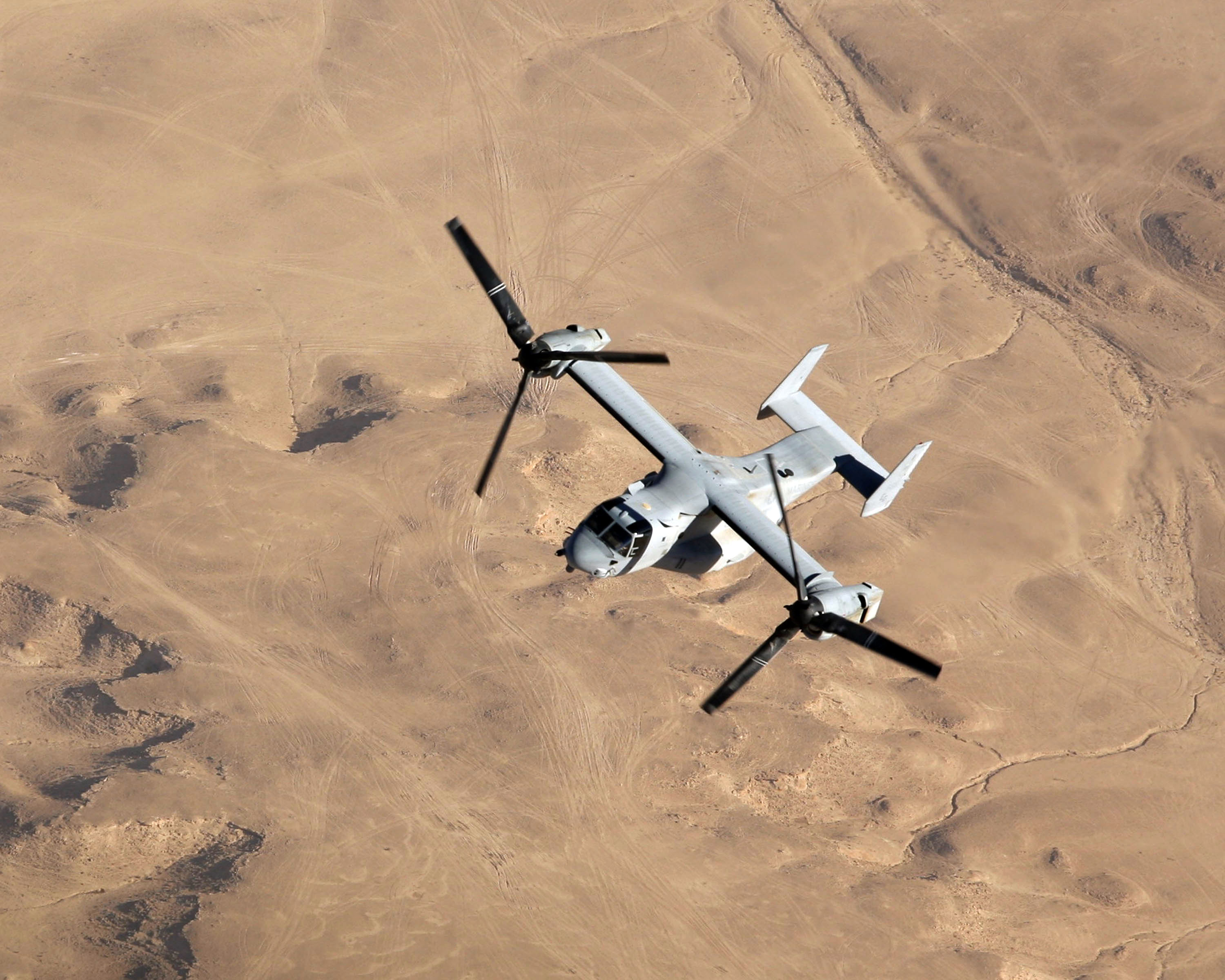 US Navy 071110-M-7404B-036 An MV-22B Osprey with Marine Medium Tilt rotor Squadron-263, flies over the Al Anbar Province of Iraq during a mission out of Al Asad Air Base