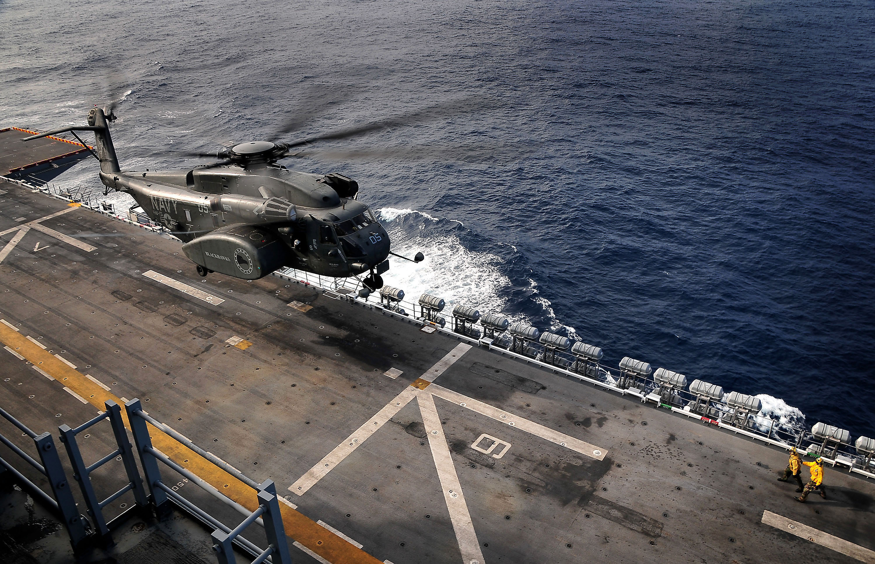 US Navy 080808-N-4774B-466 An MH-53E Sea Dragon assigned to Mine Counter-Measures Squadron (HM) 15 lands aboard the amphibious assault ship USS Tarawa (LHA 1)