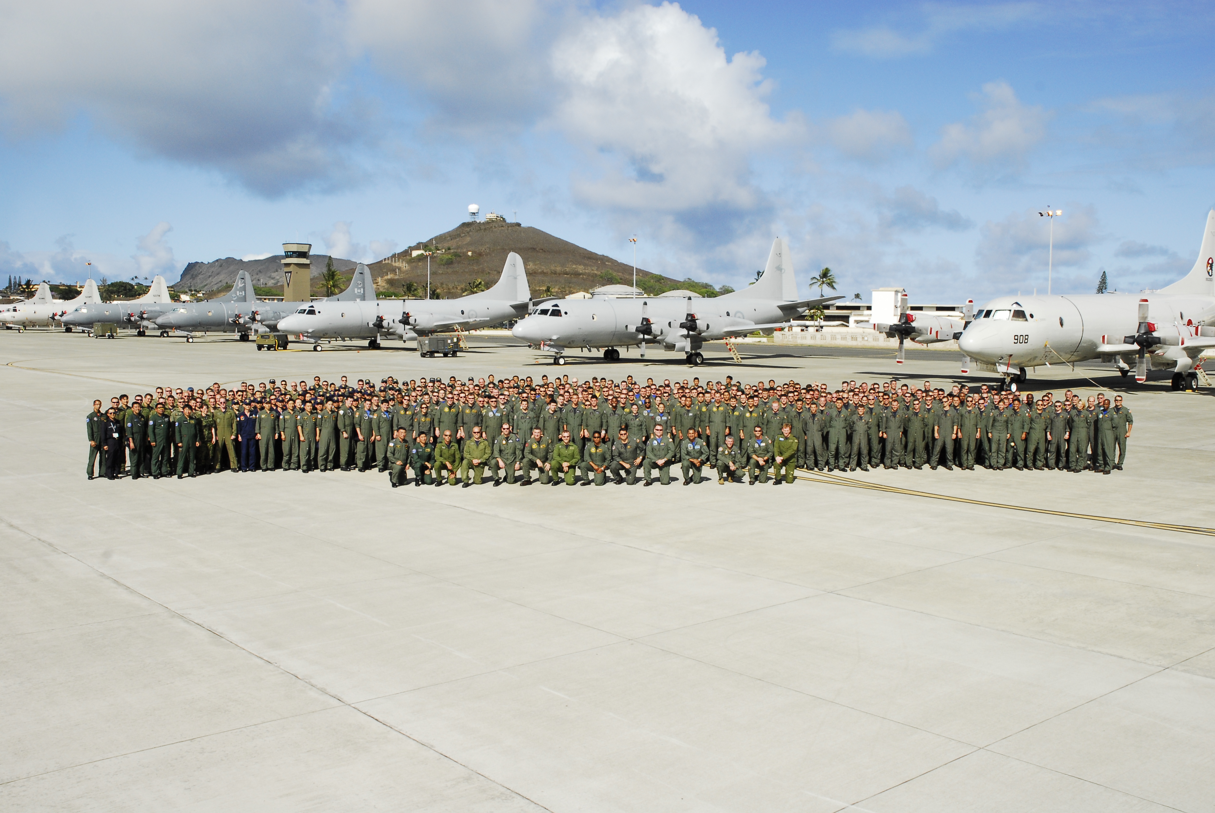 US Navy 100706-N-6855K-003 Navy and Air Force air crewmen from the U.S., Japan, Republic of Korea, Australia and Canada gathered on the tarmac at Marine Corps Air Station Kaneohe Bay