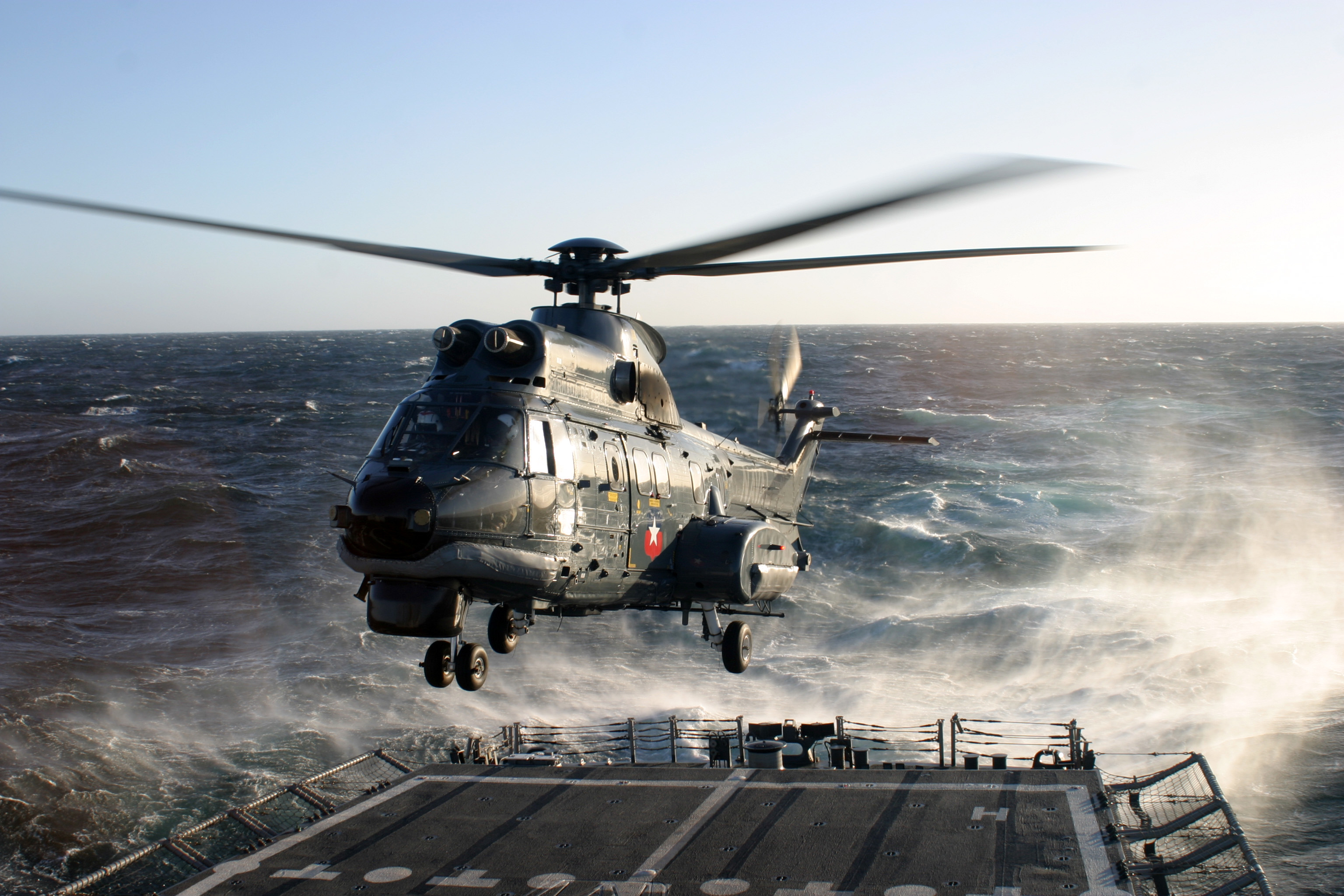 US Navy 110630-N-MN502-003 A Chilean navy SH-32 Super Puma helicopter prepares to land aboard USS Boone (FFG 28) during the Pacific phase of UNITAS