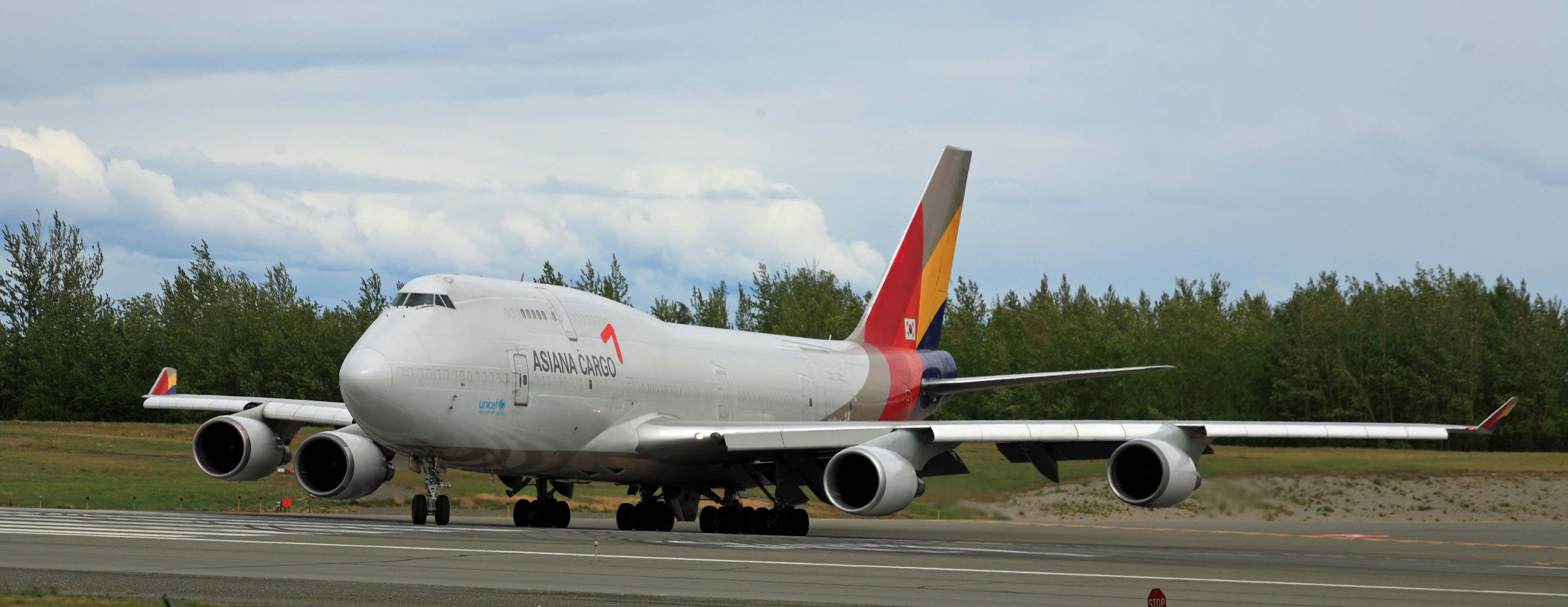 Asiana Airlines 747 Freighter turning on the active runway at ANC (6310587607)