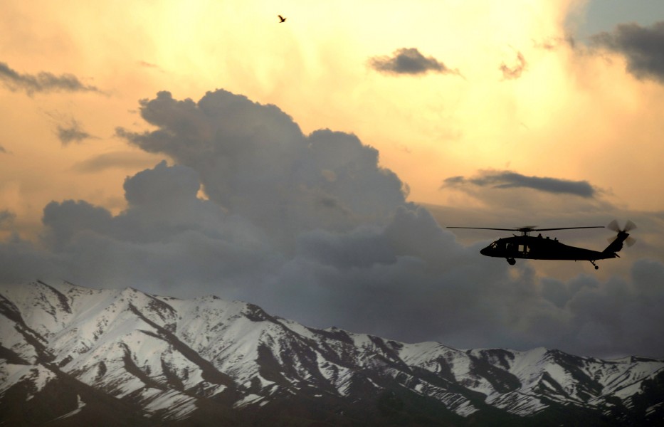 Black Hawk flying over Afghan mountains