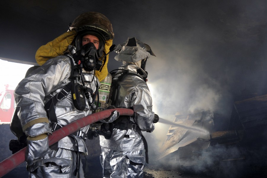 Defense.gov News Photo 100809-F-6188A-164 - Firefighters from the 447th Expeditionary Civil Engineer Squadron extinguish a fire in a training room during live-burn training at Baghdad