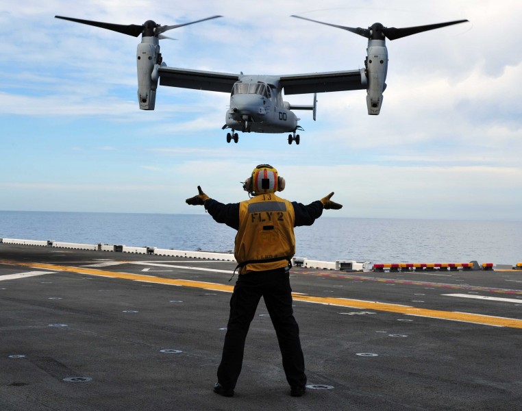 Defense.gov News Photo 110301-N-KD852-038 - An MV-22 Osprey tiltrotor aircraft attached to Marine Medium Tiltrotor Squadron 166 approaches the flight deck of the amphibious assault ship USS