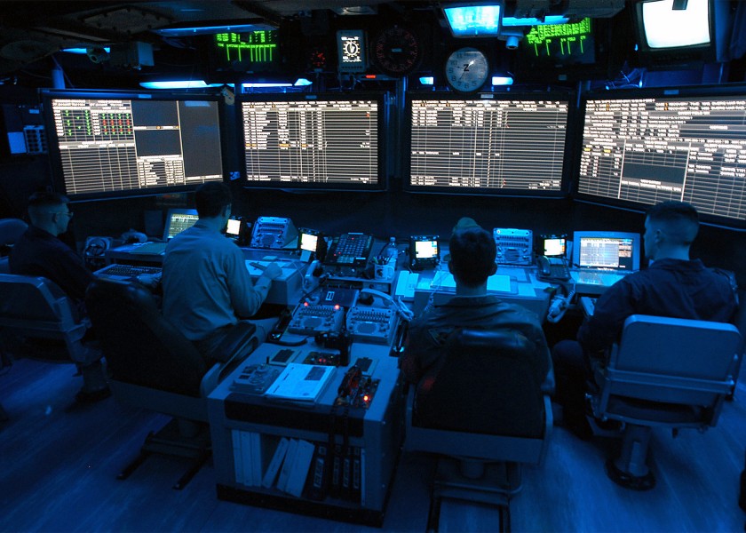 US Navy 040324-N-3986D-030 Air Traffic Controllers stand watch in the Carrier Air Traffic Control Center (CATCC) aboard USS George Washington (CVN 73)