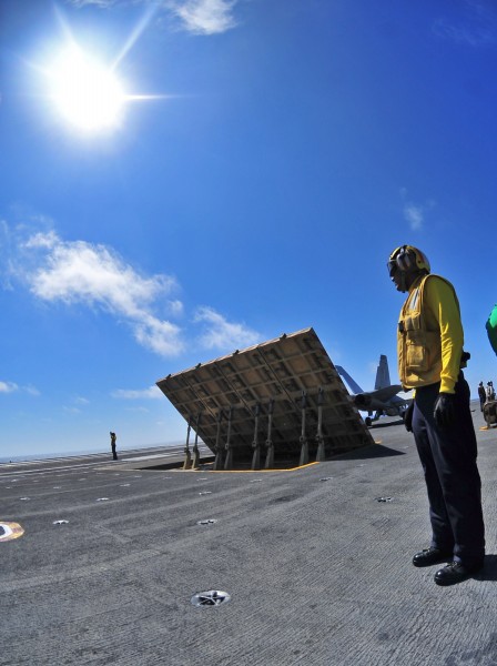US Navy 100712-N-2953W-055 Sailor directs aircraft aboard USS Carl Vinson