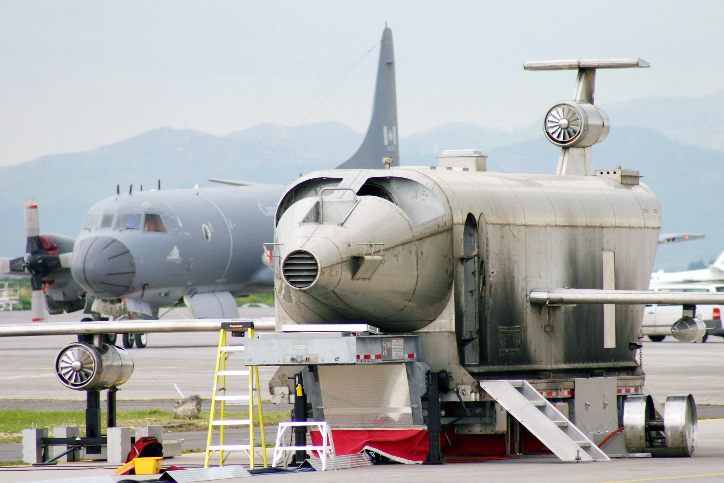 US Navy 040303-N-5821W-004 A Mobile Aircraft Fire Trainer (MAFT) sits on flight line on board NAS Sigonella