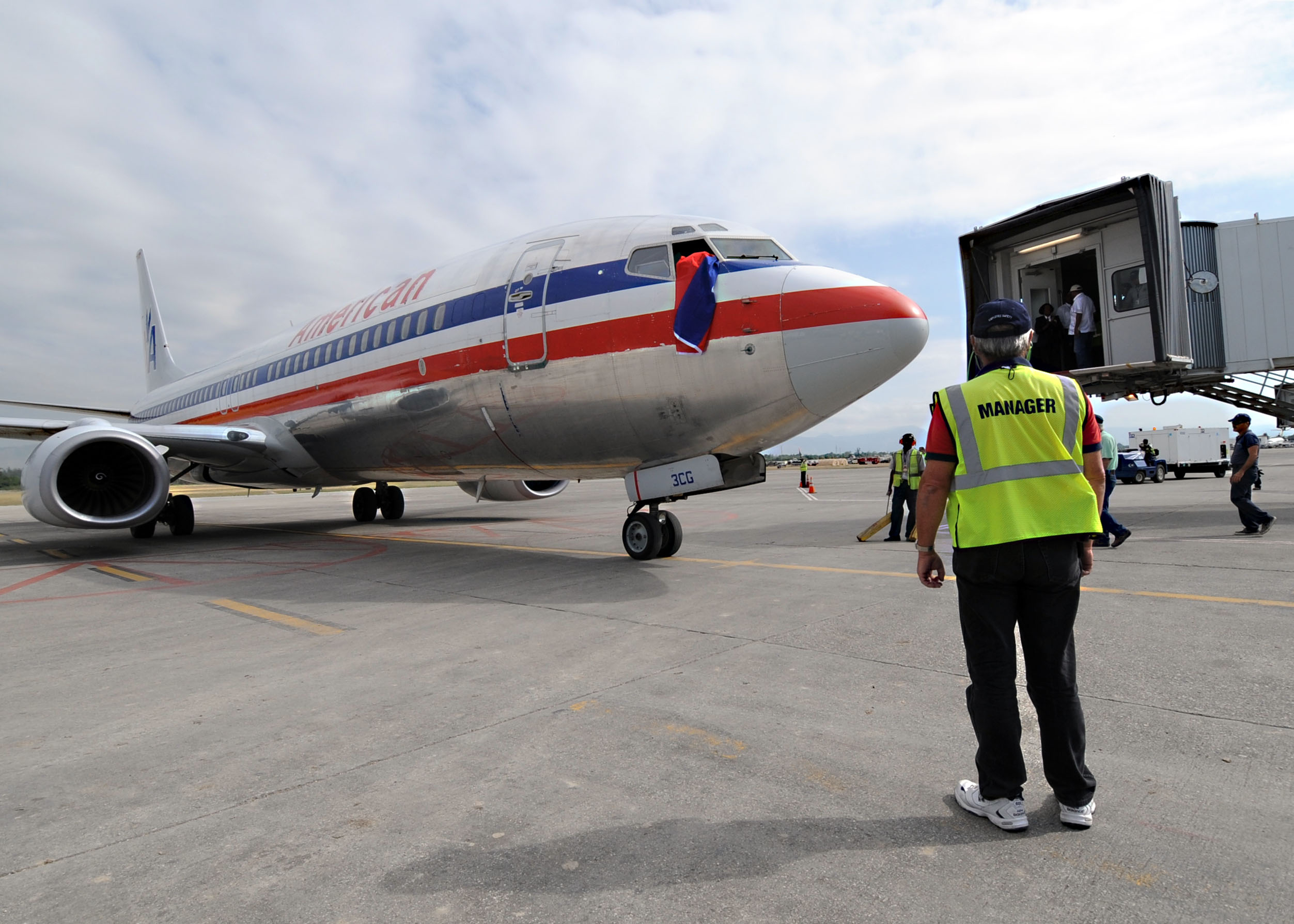 US Navy 100219-N-5961C-003 n American Airlines aircraft arrives at Toussaint Louverture International Airport in Port-au-Prince, Haiti