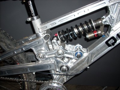 Mountainbike frame made of sections of CNC machined aluminium welded and bolted together.