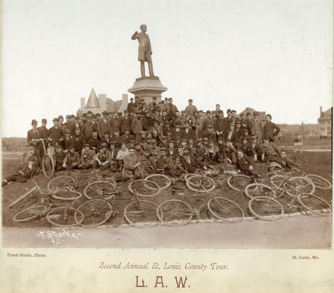 1892 Bicyclists pose near Frank Blair statue, Forest Park, St Louis. MoHIST PHO 10223