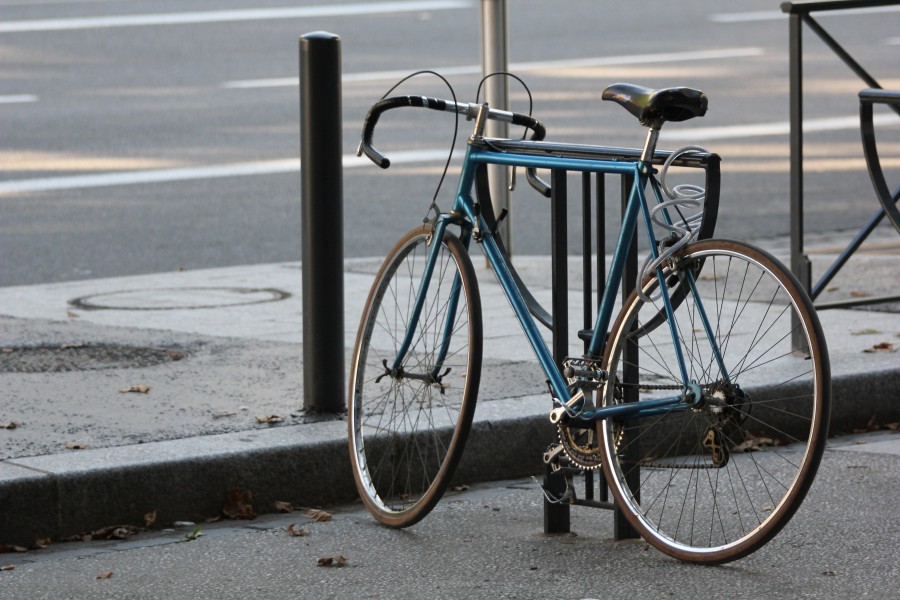 Blue bicycle facing left in Boulevard Lascrosse