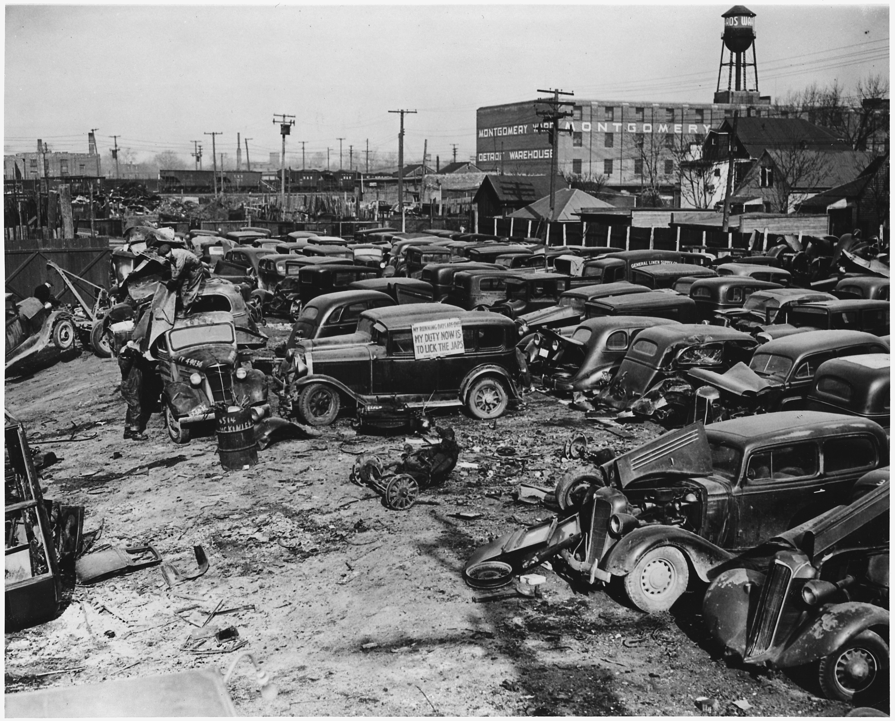 A Detroit Auto Graveyard - junked autos and trucks to be shipped to scrap yards and then to the Great Lakes Steel... - NARA - 196424