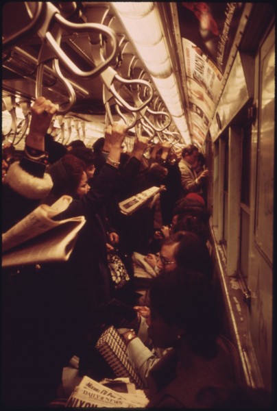 HANGING STRAPS STEADY STANDING PASSENGERS ON THE LEXINGTON AVENUE LINE OF THE NEW YORK CITY TRANSIT AUTHORITY SUBWAY.... - NARA - 556661
