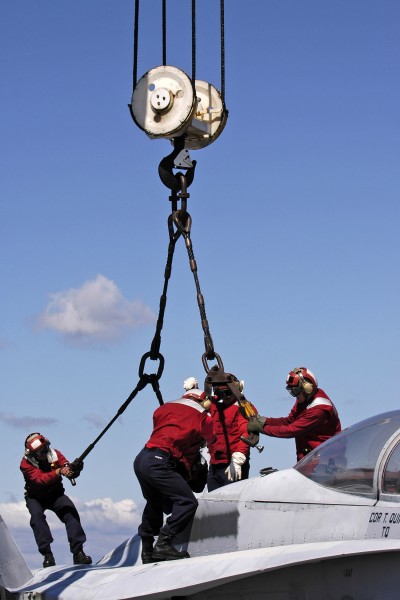 US Navy 050524-N-4166B-001 Flight Deck personnel assigned to Air Department conduct aircraft salvage training