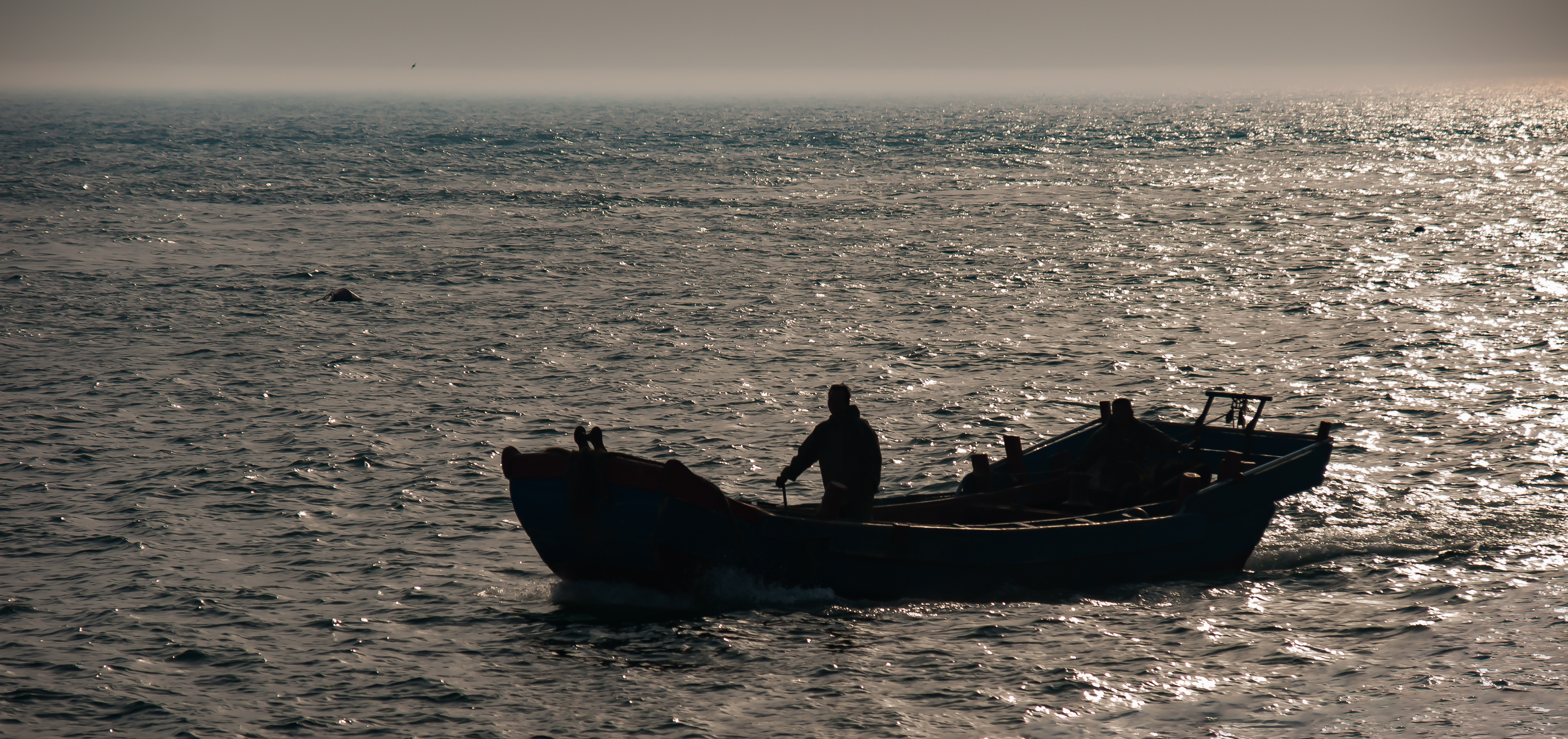 Dalian Liaoning China Fisherboat-at-sunset-01