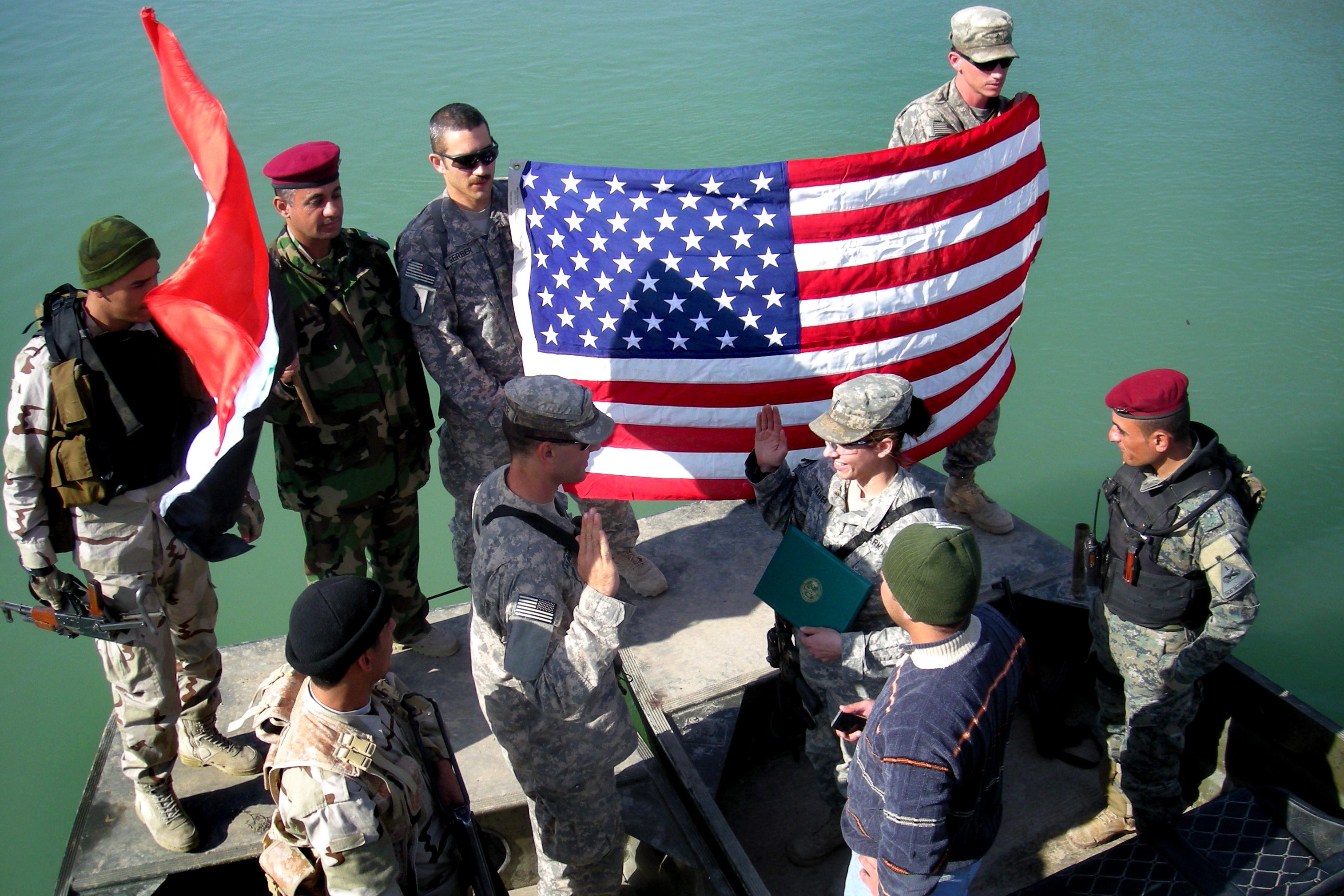 Flickr - The U.S. Army - Soldier celebrates re-enlistment with Iraqi counterparts