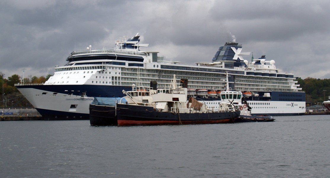 Celebrity Constellation and Tugboats