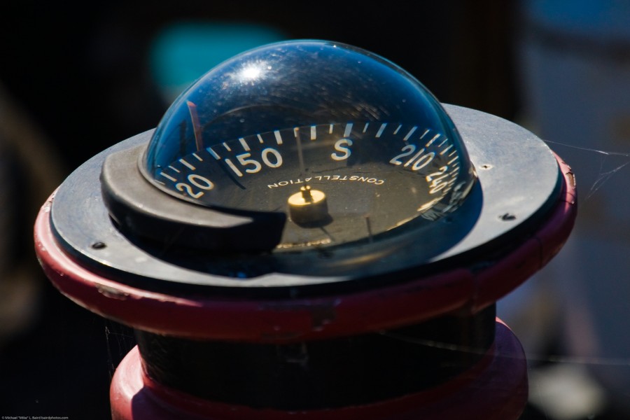 Compass on deck of derelict fishing ship