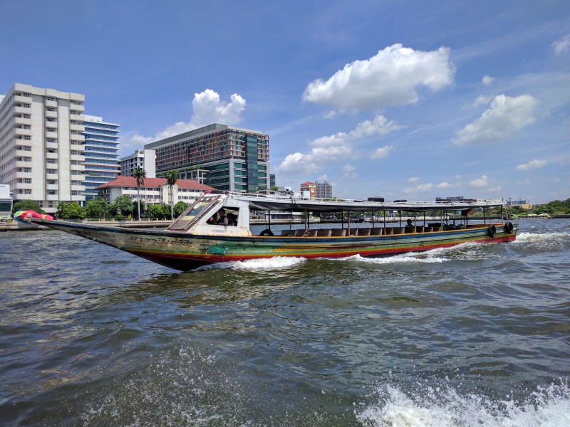 Long motorboat on the Chao Phraya River in Bangkok