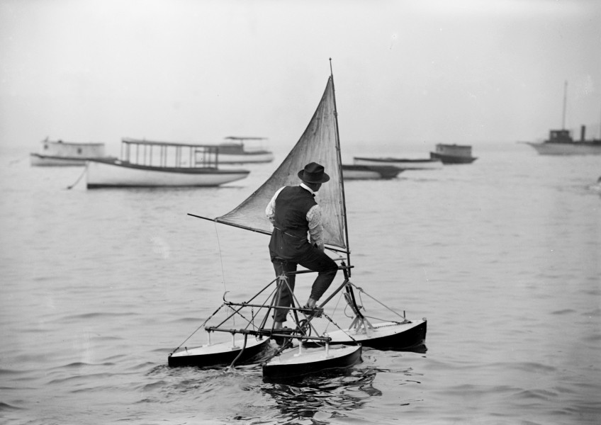 Man operating water tricycle, ca. 1900