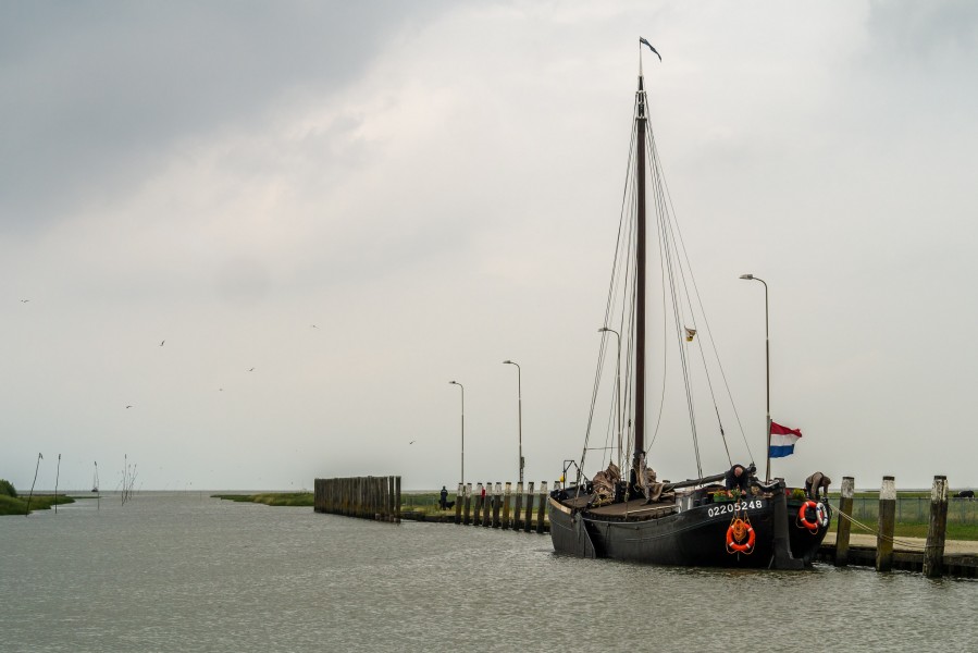 Old transport ship in the smallest sea going harbour of the Netherlands