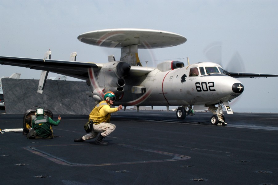 US Navy 030401-N-6817C-008 The catapult officer checks all aspects of safety before launching an E-2C Hawkeye from aboard USS Abraham Lincoln (CVN 72)