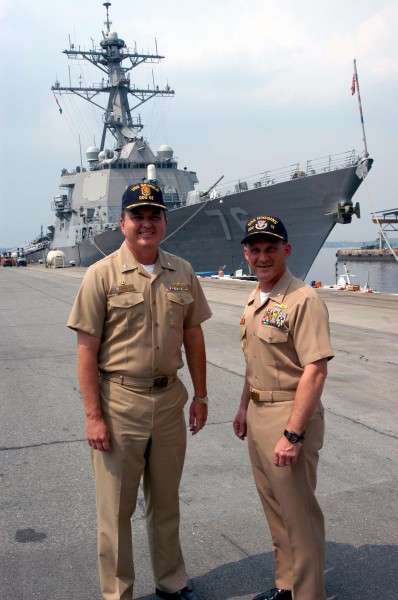 US Navy 030424-N-0021M-002 Cmdr. Mike Gilday is relieved by Cmdr. Randy Hill marking the first ever crew swap of an Arleigh Burke class destroyer