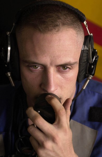 US Navy 030601-N-0413R-002 Airman Bradley Smith from Tucson, Ariz., performs the duties of phone talker