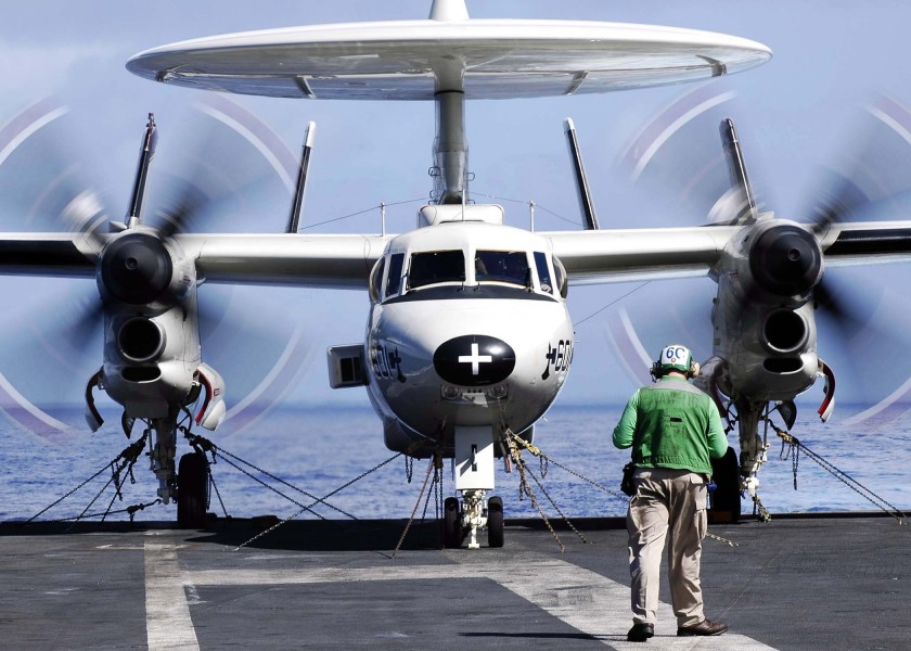 US Navy 041207-N-4166B-049 An E-2C Hawkeye places engines in full military aboard the Nimitz-class aircraft carrier USS Abraham Lincoln (CVN 72) prior to flight operations