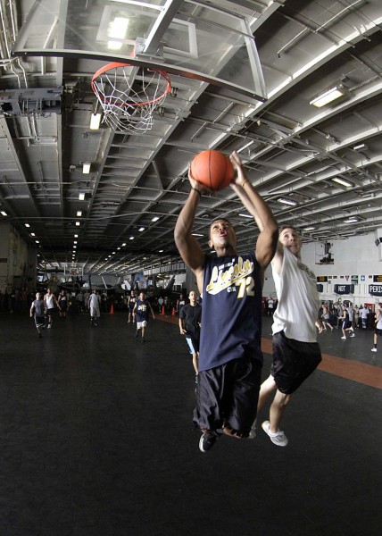 US Navy 050122-N-1229B-146 Sailors aboard USS Abraham Lincoln (CVN 72) participate in a Moral, Welfare and Recreational (MWR) sponsored basketball tournament