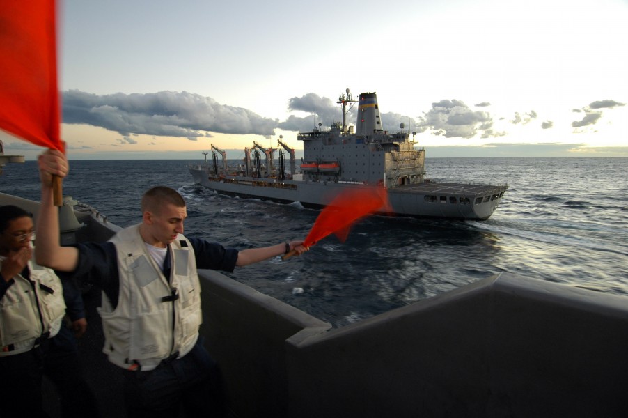 US Navy 050702-N-5781F-207 Seaman Blaine Coughlin flag walks for bridge team stationed aboard the conventionally-powered aircraft carrier USS Kitty Hawk (CV 63)