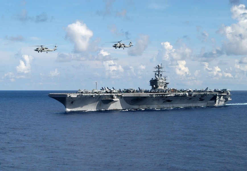 US Navy 050715-N-8163B-043 Two HH-60H Seahawk helicopters conduct operations near the Nimitz-class aircraft carrier USS Theodore Roosevelt (CVN 71) while underway in the Atlantic Ocean