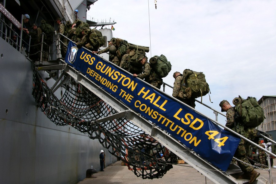 US Navy 051011-M-2175L-045 U.S. Marines assigned to 2d Platoon, Company C, 1st Battalion, 8th Marine Regiment board the dock landing ship USS Gunston Hall (LSD 44)